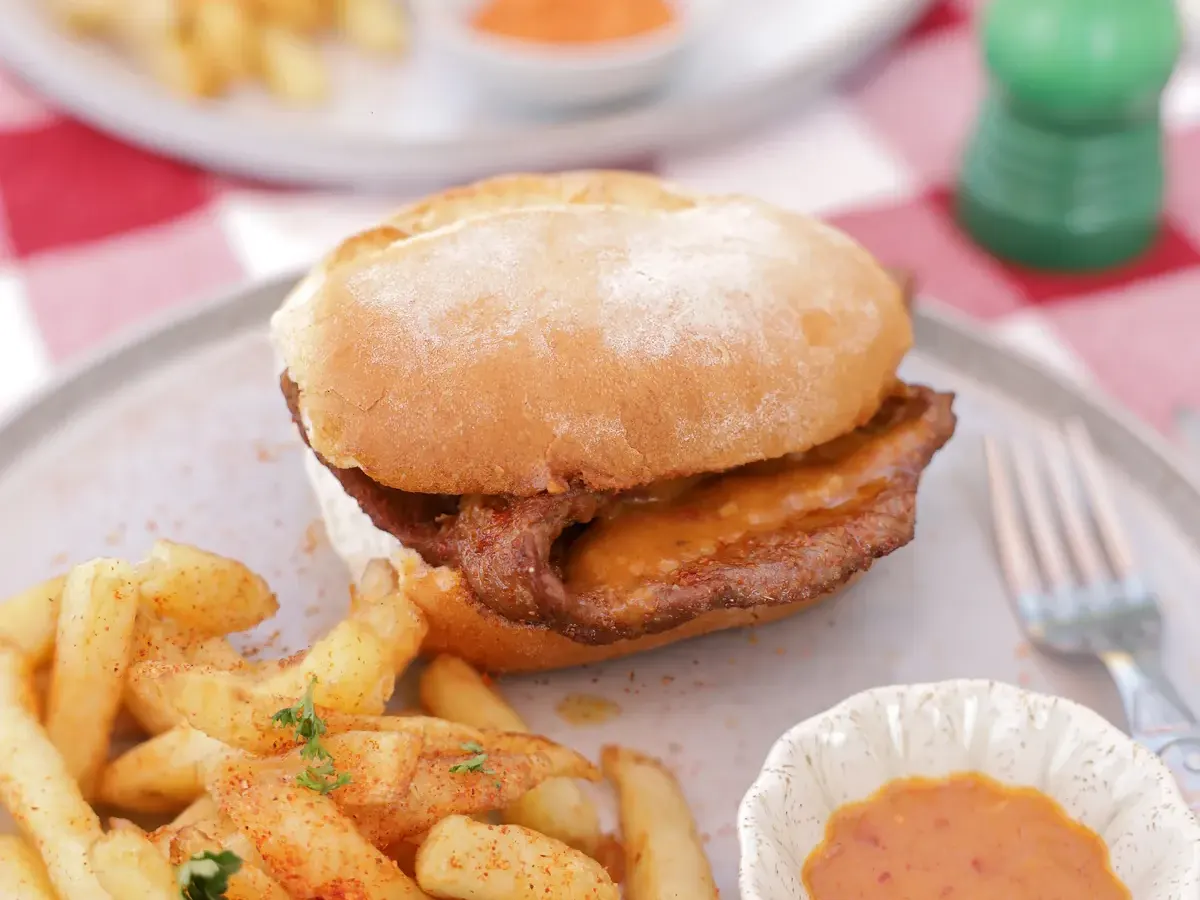 Beef prego roll with chips and peri-peri dipping sauce - Parreirinha Rapido Illovo