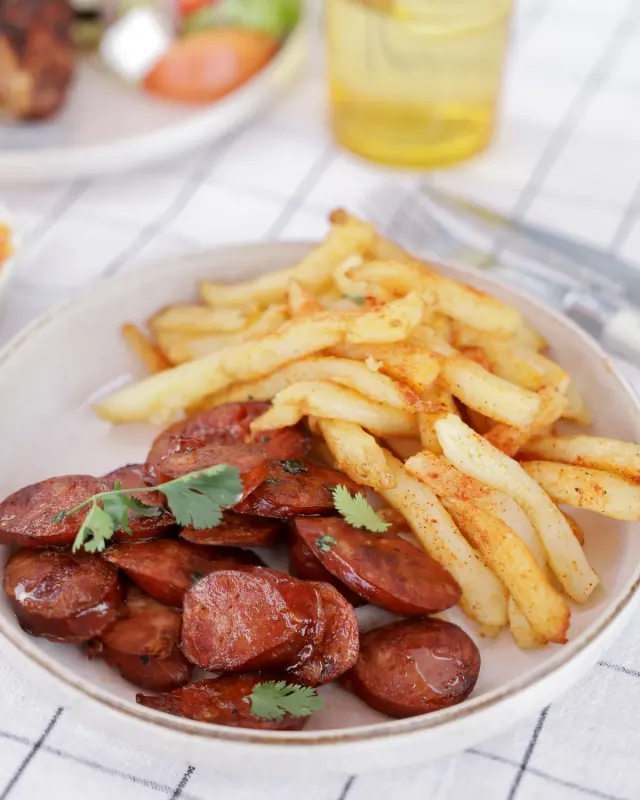 Grilled chouriço with chips and seasoning - Parreirinha Rapido Illovo
