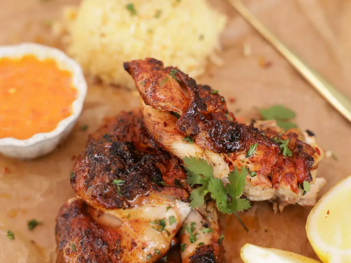 Quarter peri-peri chicken with savoury rice and sauce - Parreirinha Rapido Illovo